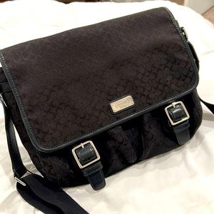 Messenger saddlebag from Coach. Roomy with multiple pockets for everything.